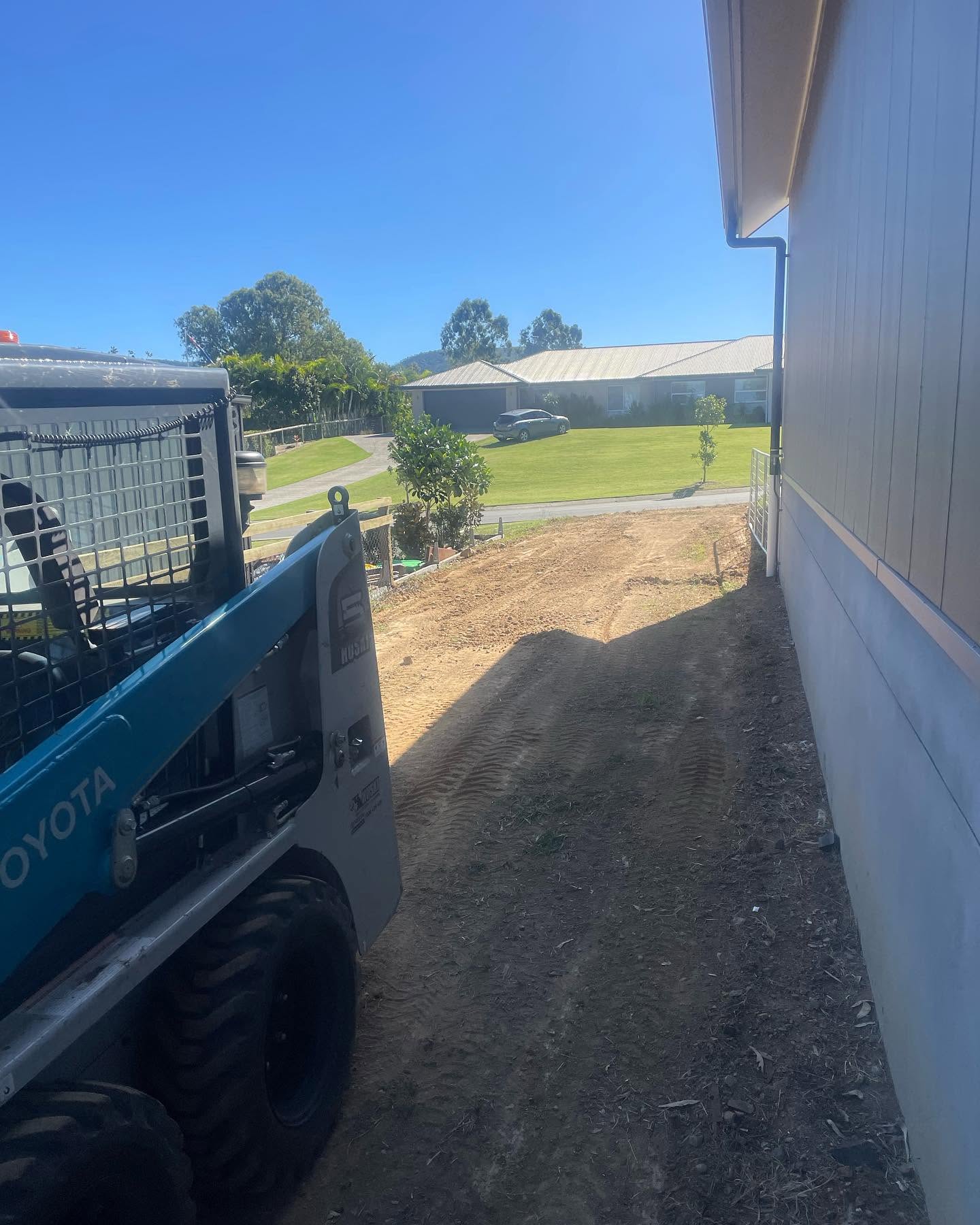 Cookies Bobcat skid steer working tight access in Ipswich
